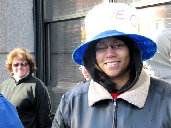 Dorchester resident Michelle Jordan arrived at 6:25 to get a decent spot. 'I went to the Inauguration but wasn't able to see him. I'm hoping to see him this time” she said, adding, We're being part of history.'  Dorchester resident Michelle Jordan arrived at 6:25 to get a decent spot. 'I went to the Inauguration but wasn't able to see him. I'm hoping to see him this time” she said, adding, We're being part of history.'